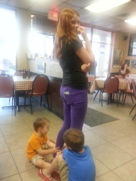 Having two littles as foot weights had the big girl giggling.